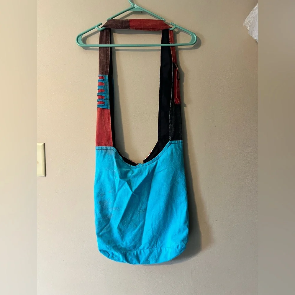 Rising International Americana Eagle bag with button and zip closure crossbody.
